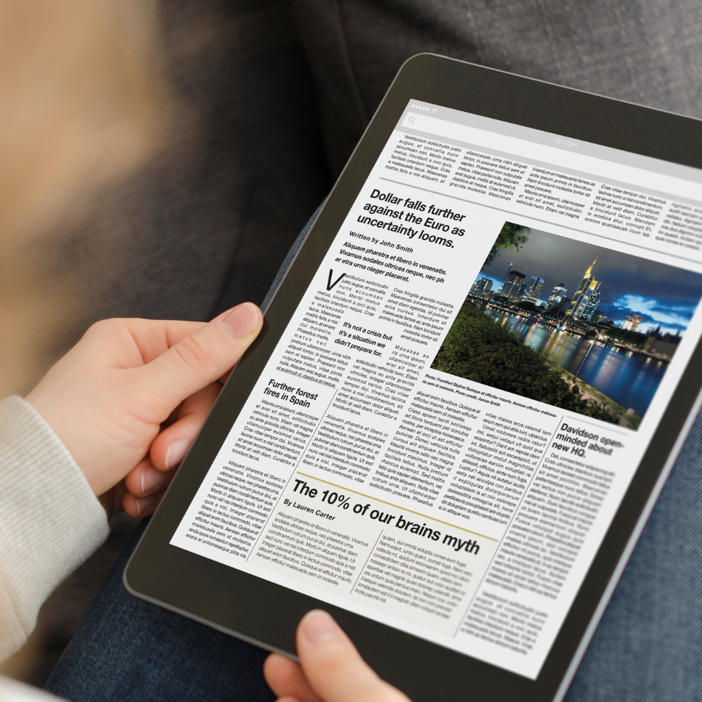 showing a hand holding a tab